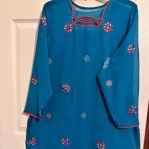 Stunning green colored Kameez and Salwar with  dupatta/scarf adorned with beads